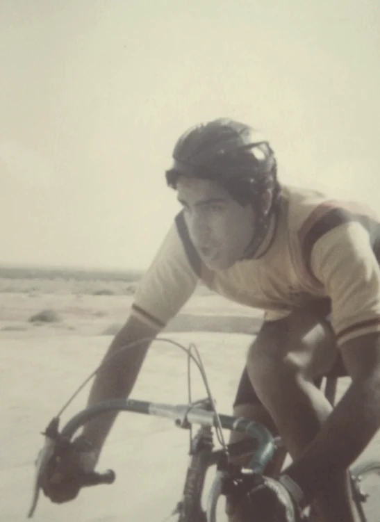 Ramo racing for the national team as a teenager, in a leather hairnet helmet on a steel road bike