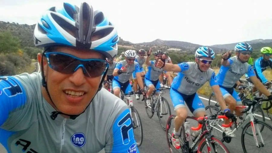 A selfie from inside a group of riders in Ramo kit on a road