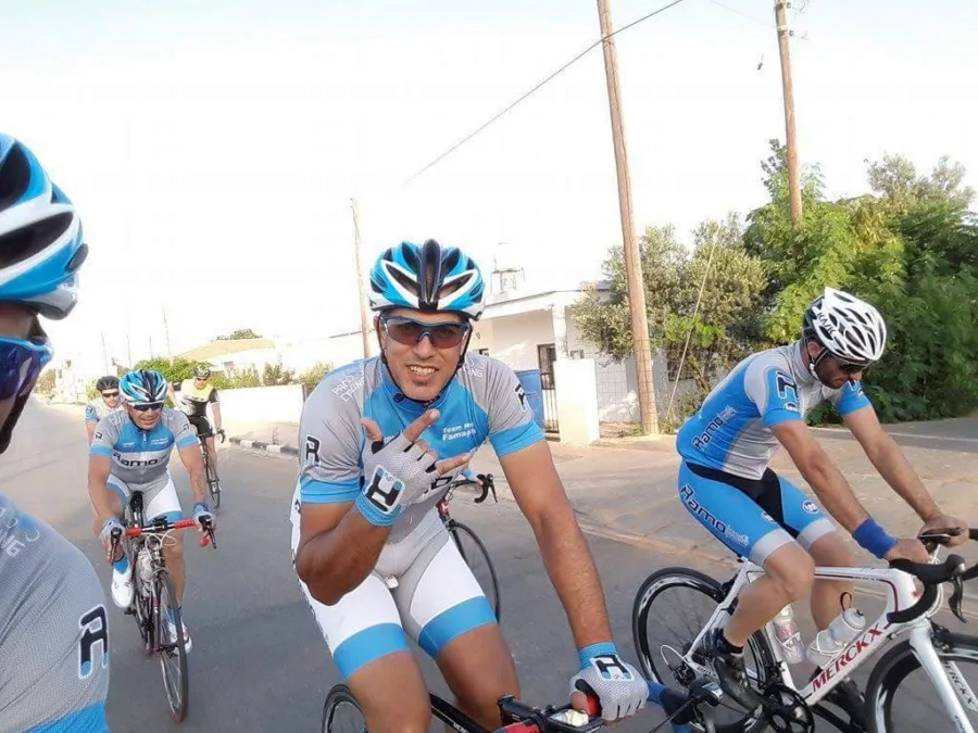 Riders in Ramo kit riding away from the camera